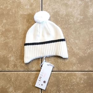 B.S. ivory knit hat with pompom